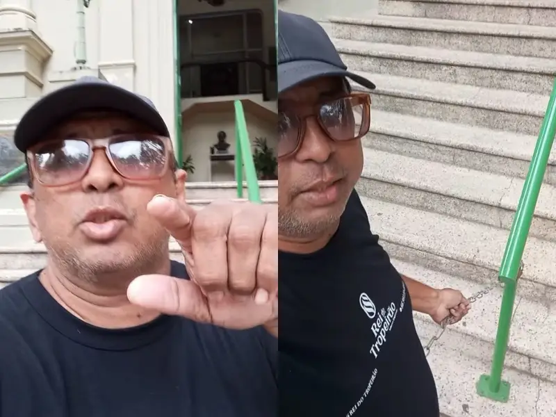 “Rei do Tropeirão” protesta acorrentado após ter trailer retirado do estacionamento da Ponte Estaiada